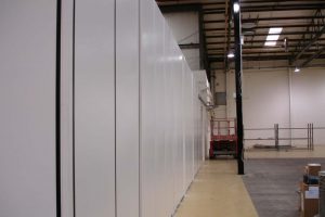 Run of double skin steel partition