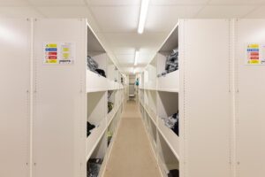 Shelving with bin fronts