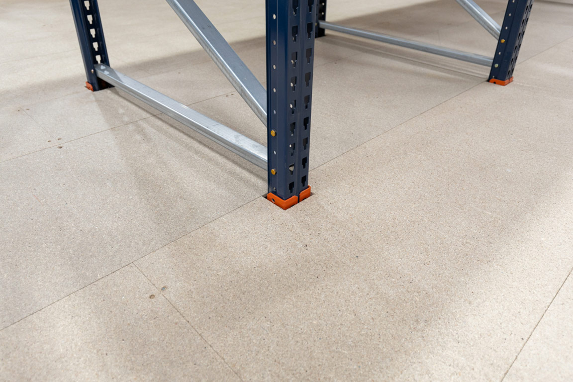 Mezzanine deck cuts for racking upright