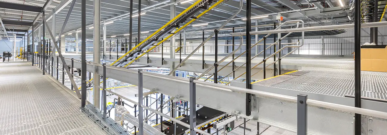 How_To_Create_Space - Avanta UK Large multi-tier mezzanine with steps and conveyor