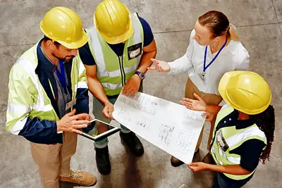 Principal contractor discussing warehouse plan with client