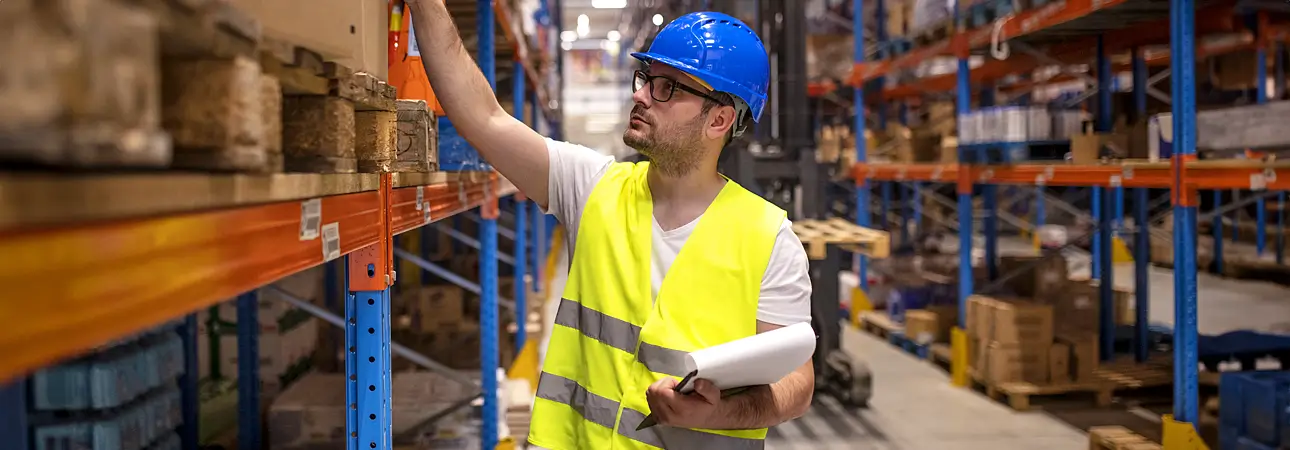 Your Duties - Avanta UK Warehouse employee checking racking